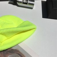 Mężczyźni kobiety zima jesień jednolity kolor ciepła, z wełny czapka z dzianiny fluorescencyjne mankietem czapka typu Beanie czapki damskie cieplejsze czapeczki nieformalna czapka 4